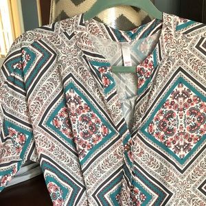 Colorful blouse, button down.